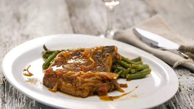 Свински котлети в портокалов сос